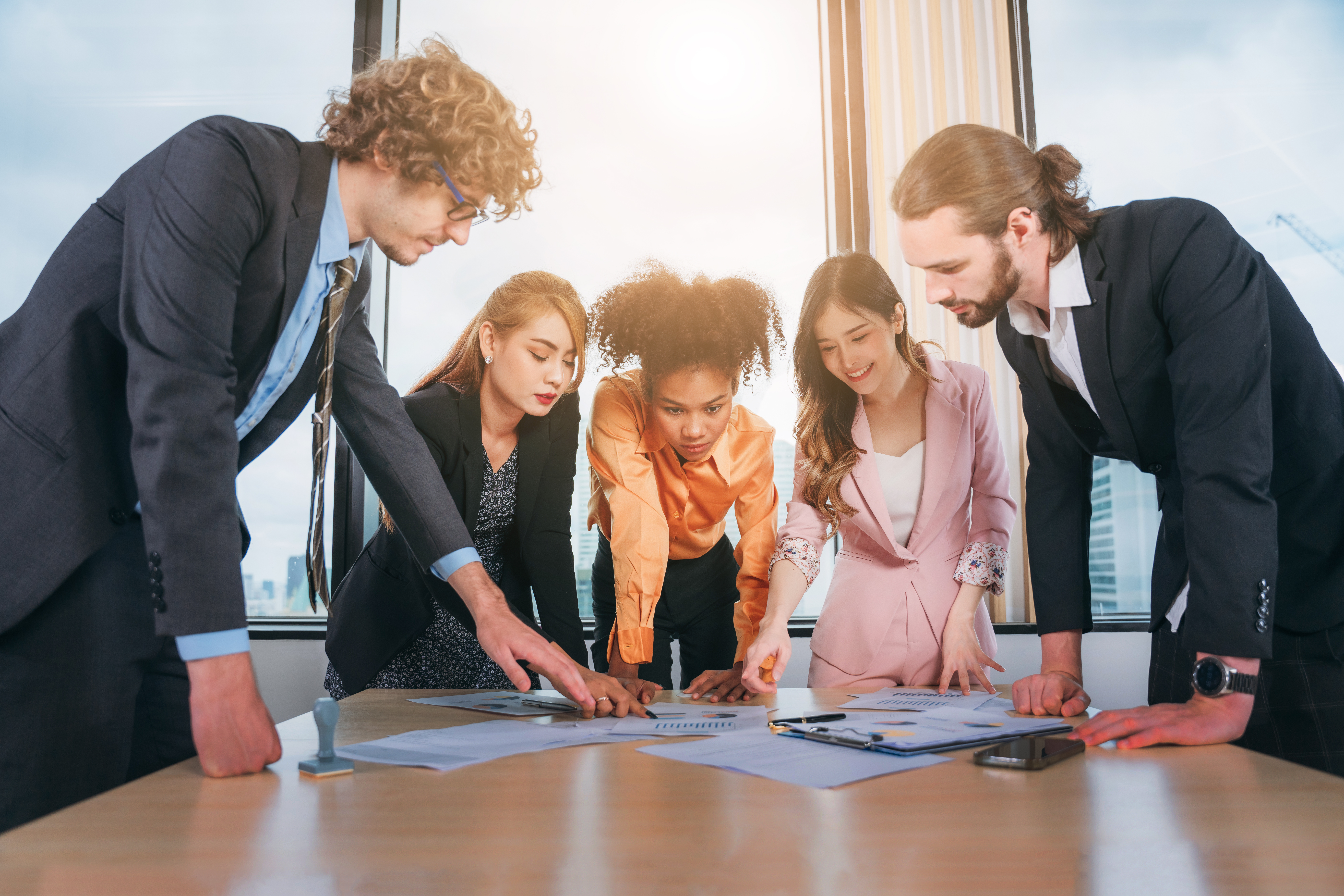 A business development consulting team collaborating together.